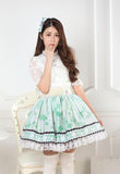 Sweet Light Green Short Skirt Cute Clover Printed Lolita Pleated Skirt with Lace Trimming